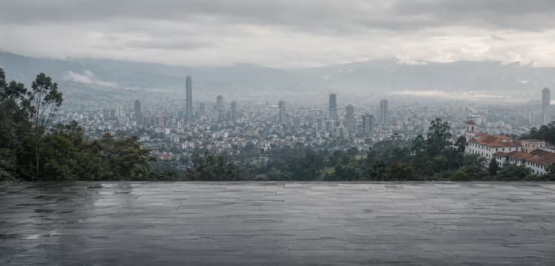 A Colombian city in an Andean valley under low cloud