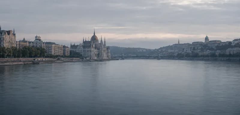 Budapest's parliament along the Danube in morning mist