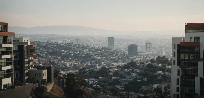 Tijuana's hillside cityscape below the coastal range